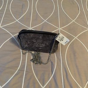 Ashley Stewart floral shoulder purse.